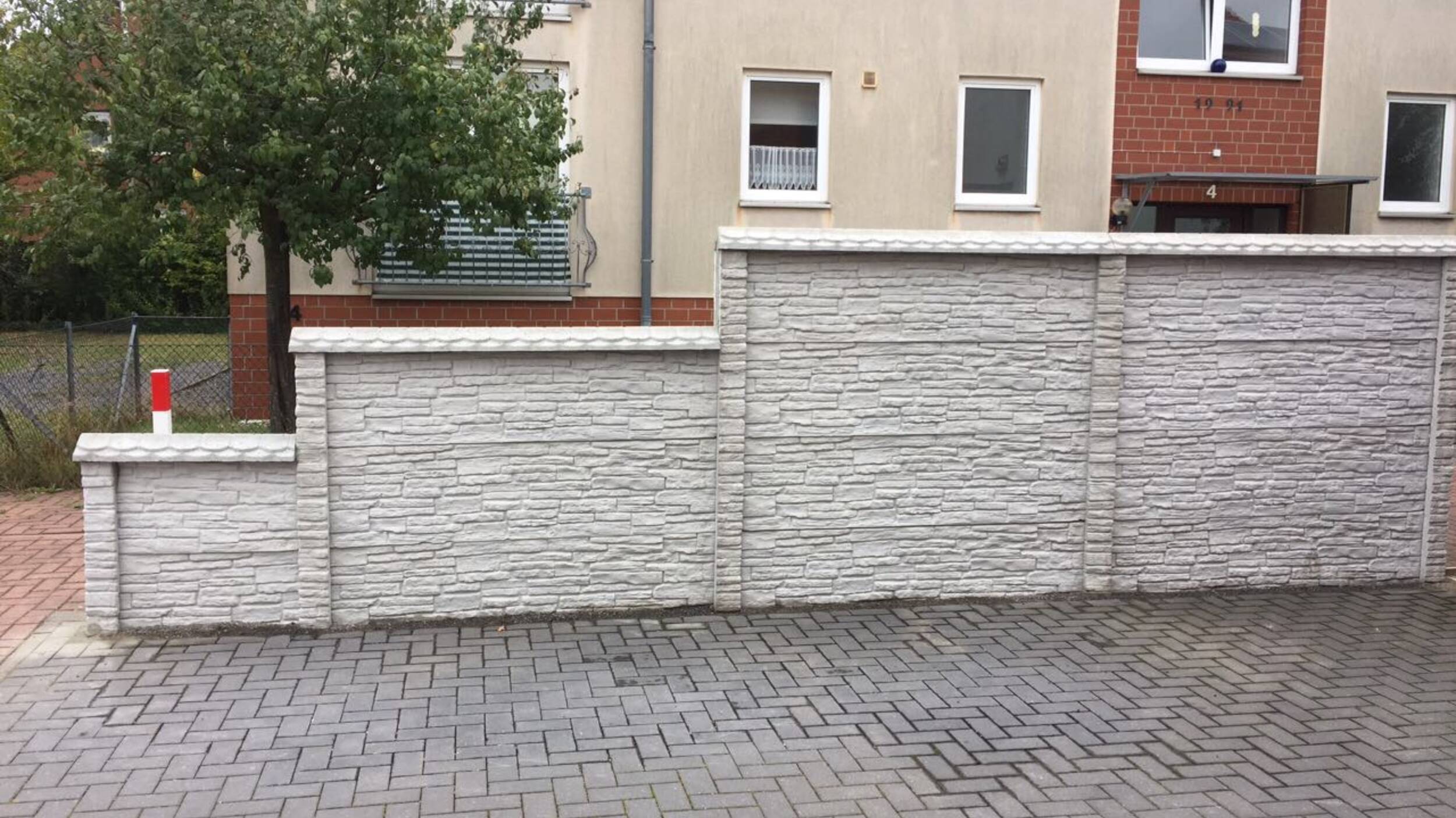 Zaunteam Betonzaun in Bruchstein Optik